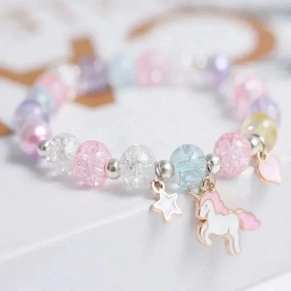 Pastel pink blue purple beaded bracelet with stars and unicorn charms girls gift